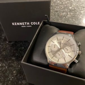 Never worn Kenneth Cole watch -men’s bur can be worn womens